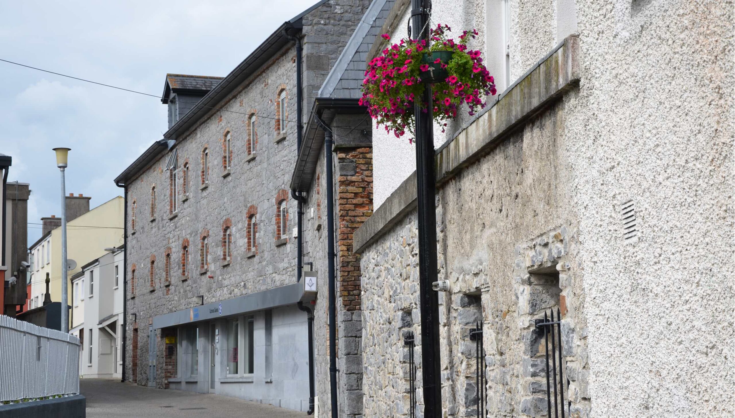 Kilkenny street scene with flowers on pole